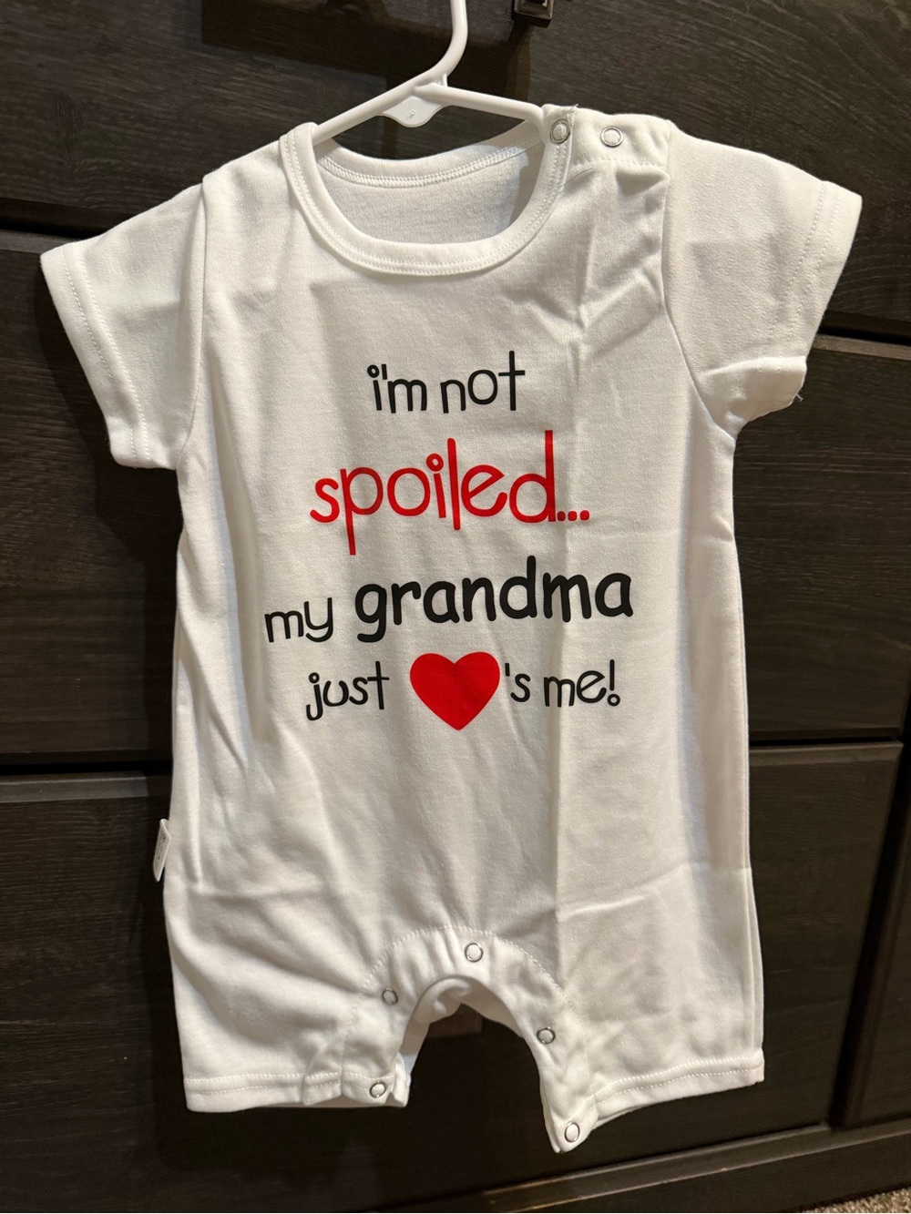 White Baby Romper with Red Heart & 'I'm Not Spoiled' Graphic